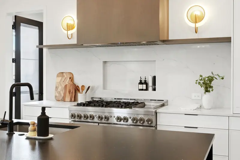 White kitchen with a six-burner range