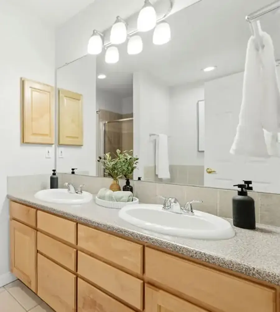 Staged bathroom with a double vanity
